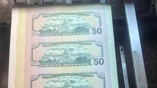 Title: Images - Printing Press Detained for Counterfeit Currency