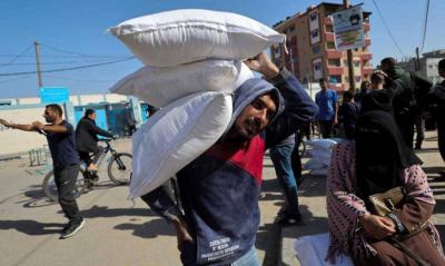 Title: First Shipment of Humanitarian Aid Unloaded in Gaza