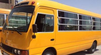 Title: Young Woman Falls from School Bus in Tripoli