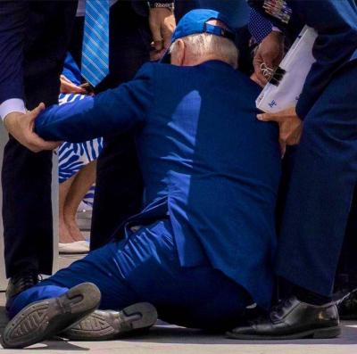 Title: Biden Trips During Graduation Ceremony and Falls