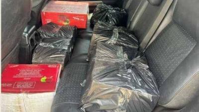Title: "Regie" Seizes Counterfeit Molasses in Doura