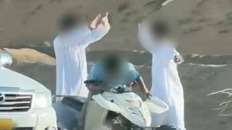 Title: Two Young Men Arrested for Assaulting a Resident in Oman