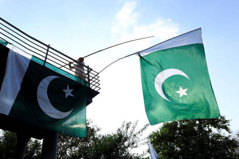 Title: 24 Killed in Twin Blasts Near Candidate Offices Ahead of Pakistani Elections