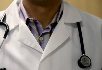 Doctor Assaults Patient Tied to Hospital Bed (Video)