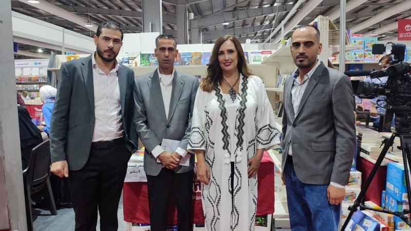 Al-Qusayfi Receives Magda Dagher's New Book