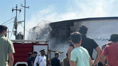 # Large Fire Devours Shops in Iraq