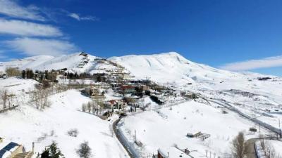Title: "The Lebanese Village of Kfardebian: A Global Capital?"