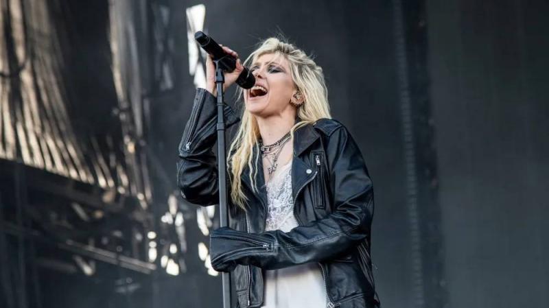Bat Bites Singer on Stage in Front of Audience