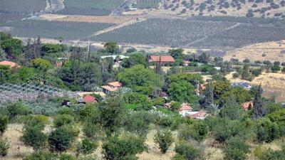 Title: Two Buildings Hit in Manara Settlement by "Hezbollah" Rockets