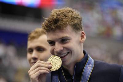French Swimmer Marchand Wins Gold in Men's 400 Meter Individual Medley