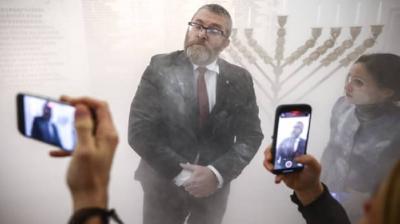 Polish Lawmaker's Immunity Lifted After Extinguishing Hanukkah Candles in Parliament