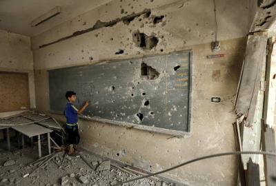 Title: 10 Palestinians Killed in Israeli Shelling on School in Gaza