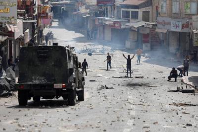 Title: Palestinian Foreign Ministry Calls for ICC Action After Killing of Three by Israeli Gunfire