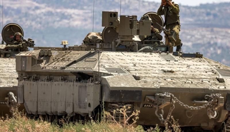 Title: Israeli Troop Carrier Destroyed by Anti-Tank Missile in Gaza