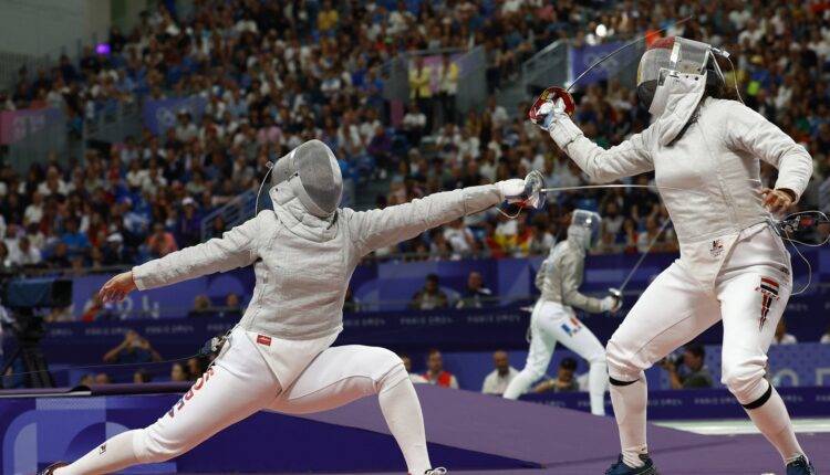Title: Pregnant Fencer Participates in Olympics!