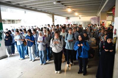 Students Observe Moment of Silence in Honor of Martyrs from Ainatha