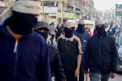 In the Absence of Police in Gaza, Security Groups Operate on the Streets