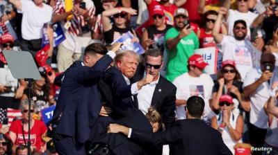 Suspicious Behavior of a Girl Behind Trump’s Platform: Was She Part of the Assassination Team?