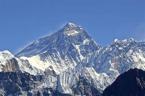 On Mount Everest: The Melting White Veil Reveals Hundreds of Corpses