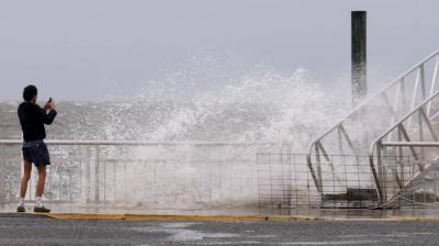 America... Storm Debbie Claims 4 Lives and Threatens Catastrophic Flooding