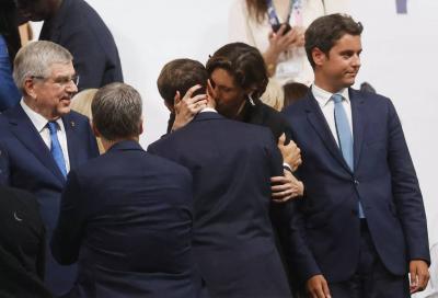 Controversial Kiss from French Minister on Macron's Neck