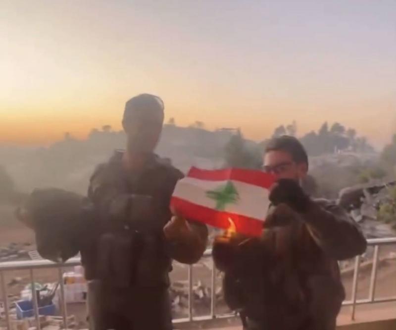 جنود إسرائيليون يحرقون العلم اللبناني (فيديو)