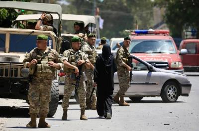 مسيرة زقاق البلاط.. توقيف المسلحين المتورطين وإحالتهم إلى القضاء