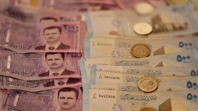 ما شروط نجاح فكرة حذف صفرين من العملة السورية؟