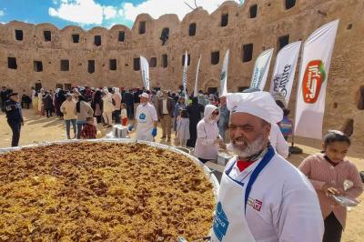الليبيون يحتفون في "مهرجان يوم الكُسكُسي"