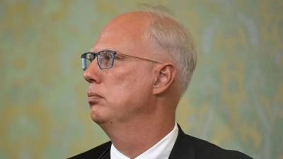 مفاوض روسي يسخر من المستشار الألماني: 