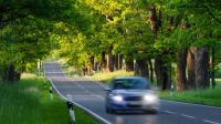 Using headlights for cars even during the day Using car headlights even during the day.