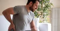 Lower back pain resulting from kidney deposits. Lower back pain caused by kidney deposits