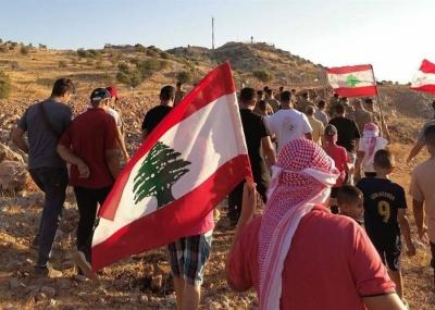 توتر جنوبي لبنان.. مسيرة وأعلام