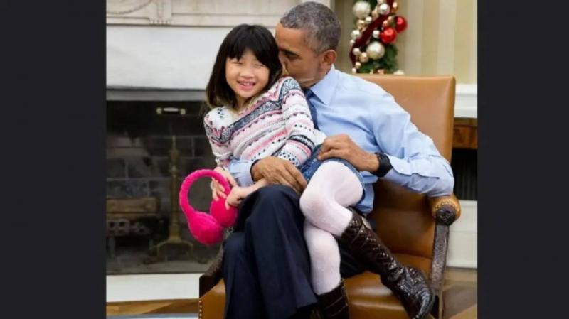 صورة مع طفلة تورط أوباما.. ما حقيقتها؟