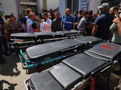 نقل جثامين موظفي الإغاثة إلى معبر رفح (صور)